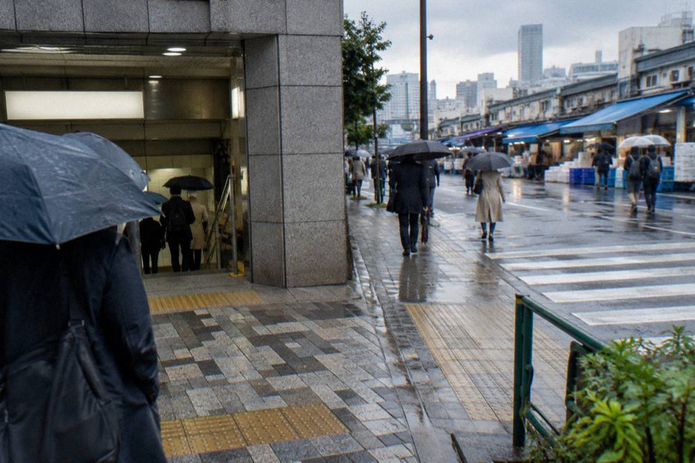 Signage outside a subway station entrance near the Tsukiji market
